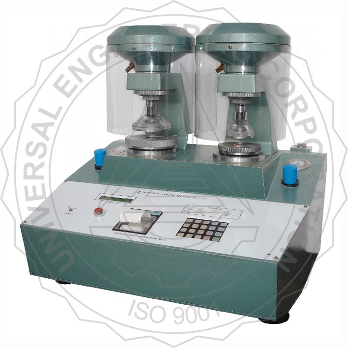 Alat Uji Instrument BURSTING STRENGTH TESTER-DOUBLE HEADED KEY PAD OPERATED, PNEUMATIC CLAMPING FOR PAPER & CORRUGATED BOARD UEC-1010 E1